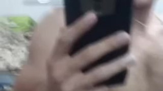 Handsome hot guy cumming in front of the mirror