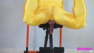 Muscle man playing in full zentai suit