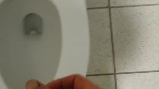 Dude jerks off quietly in stall next to you.