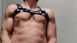 PecsPup cums on the mirror harness and handcuffs