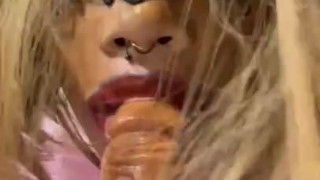 Sissy sucking huge dildo