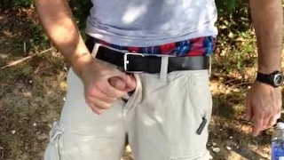 Public masturbation in the woods - jerking off by the water and cumming.
