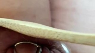 Caged boy gets his balls busted with wooden spoon