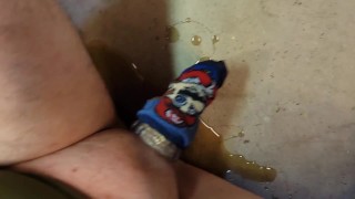 Pissing in cock sock then rubbing my dick in pee