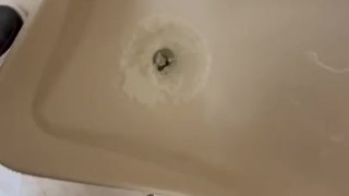 Urinal pissing public restroom