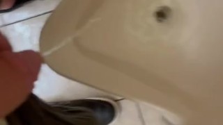Urinal pissing public restroom