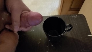 Filling a cup with cum part 2