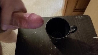 Filling a cup with cum part 2