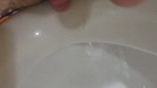 Boy Pussy fucks pushs the edge of public men toilet, rubbing clit on toilet 