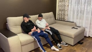Two friends jerk off in sporwear and cum