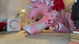 Riding my pink inflatable unicorn