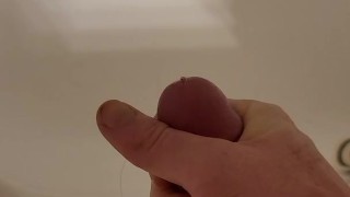 Stroking and pissing all over my shower/myself 