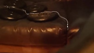 Rubber GIMP in chastity cage and pluged in the floor and presenting