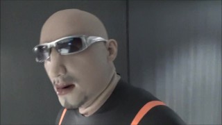 quick walk to hotel elevators in orca wetsuit, silicone mask and massive hardon
