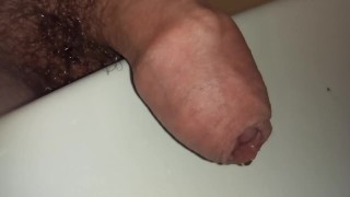 uncutted foreskin close up while peeing