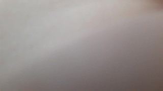 Cute twink shoots a load on himself and plays with the cum