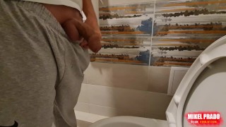 Guy films him peeing in the toilet