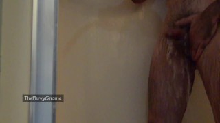 Skinny guy with small cut cock showering; pee, jerk and cum