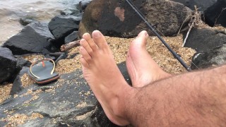 Rod in hand skinny dipping in the lake cheeky day with my feet - Manlyfoot Roadtrip - Sock sniffing