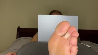 hot guy relaxes his soles