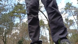 outdoors squat pissing in the forest