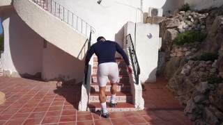 working out in very see through white spandex