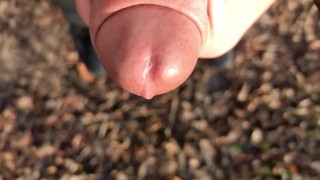 Uncut cock cums close up outside