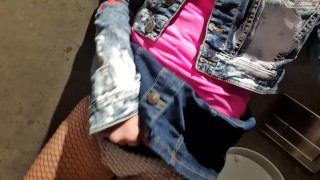 Blonde at public toilet masturbating and fingering