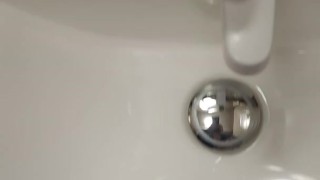 Jerking im public restroom finisched with piss