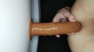 skinny gay fucks ass with a huge dildo
