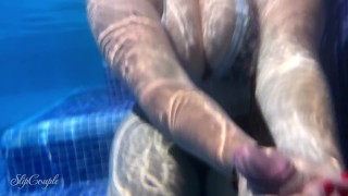 Big tits slut gives perfect handjob in hotel pool - high risky with cumshot in pool :P !