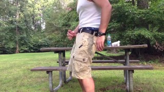 Masturbating in the public park next to the busy road. 