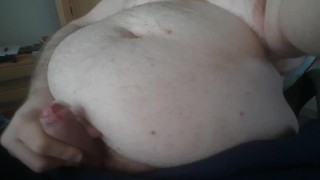 Chubby rubs his fat belly and cums