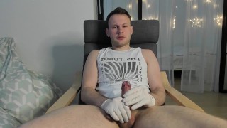 Mark jerks off in latex gloves