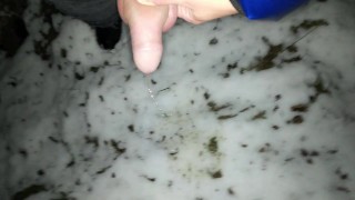 Pulling back foreskin and peeing to the snow