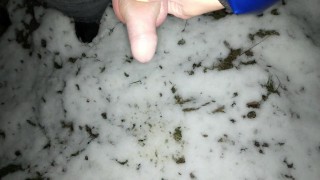 Pulling back foreskin and peeing to the snow