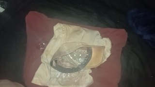 Pissing all over clothes before putting back on