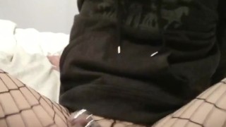 Locked and plugged femboy in fishnets