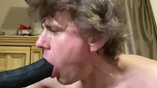 practicing Sucking a big black 12 inch cock