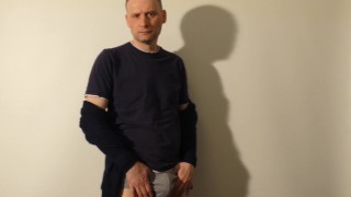 Kudoslong strips for the camera then with underpants around his neck as he masturbates