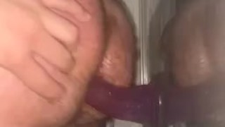 Fucking dildo against open window 