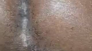 Cum running from Jamaican ass with clit.