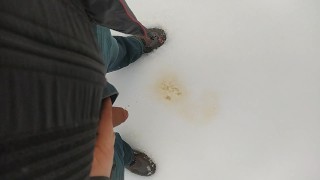Pee on snow outdoor
