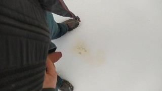 Pee on snow outdoor