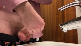 Hairy guy in suit pissing and jerking off at office toilet and cum into restroom's sink