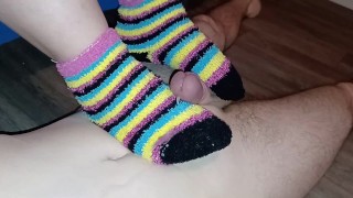Cumming on her warm, fluffy rainbow socks - Jake & Cassandra