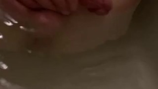 Butthole winking under water in bathtub 