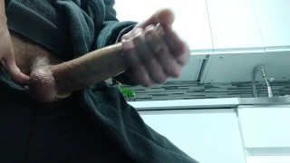 Guy in Robe Jerks His Huge Hard Cock in the Kitchen and the Cumshot Rains Out