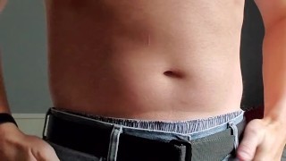 Fit daddy strips and jerks until he blows a dripping load of cum