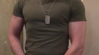 Muscular army guy flexing big biceps and shooting cum, ready to fight!